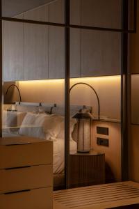 Una cama o camas en una habitación de The Blackpine Hotel - Small Luxury Hotels