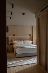 Una cama o camas en una habitación de The Blackpine Hotel - Small Luxury Hotels