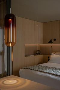 Una cama o camas en una habitación de The Blackpine Hotel - Small Luxury Hotels