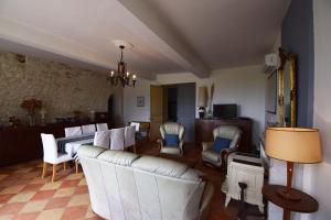 Posezení v ubytování Maison à la campagne pour 8 personnes - Clévacances 3 clés