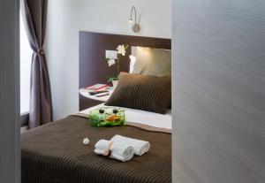 Postel nebo postele na pokoji v ubytování B&B Radici