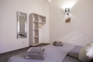 Postel nebo postele na pokoji v ubytování Villa Dushi Bida
