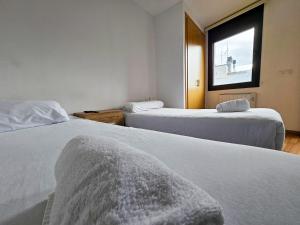 Postel nebo postele na pokoji v ubytování Apartamentos La Solana Deluxe 3000