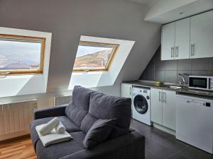 Kuchyň nebo kuchyňský kout v ubytování Apartamentos La Solana Deluxe 3000