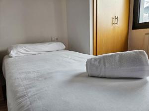 Postel nebo postele na pokoji v ubytování Apartamentos La Solana Deluxe 3000 + 37 fotografií
