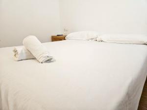 Postel nebo postele na pokoji v ubytování Apartamentos La Solana Deluxe 3000