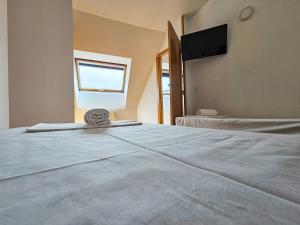 Postel nebo postele na pokoji v ubytování Apartamentos La Solana Deluxe 3000