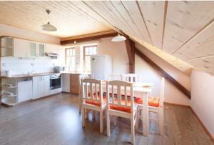 Kuchyň nebo kuchyňský kout v ubytování Apartmány Bardi