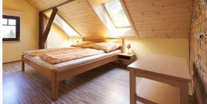 Postel nebo postele na pokoji v ubytování Apartmány Bardi