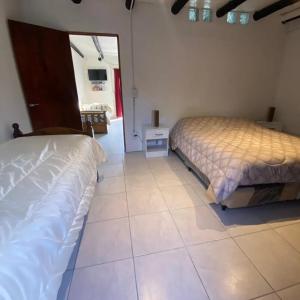 Postel nebo postele na pokoji v ubytování Rincón Moscatel