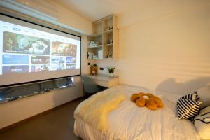 Uma cama ou camas num quarto em Bundside NJE 3BR Suite