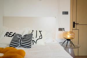 Uma cama ou camas num quarto em Bundside NJE 3BR Suite