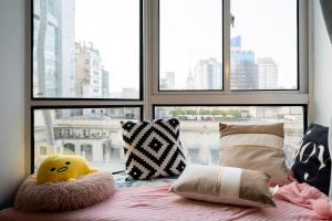 Uma cama ou camas num quarto em Bundside NJE 3BR Suite