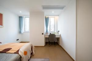 Uma cama ou camas num quarto em Bundside NJE 3BR Suite