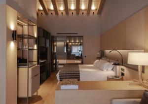 Una cama o camas en una habitación de The Blackpine Hotel - Small Luxury Hotels