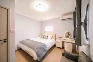 Uma cama ou camas num quarto em Bundside NJE 3BR Suite
