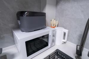 A cozinha ou kitchenette de Bundside NJE 3BR Suite