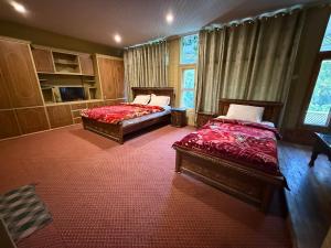 Summit guest house skardu客房内的一张或多张床位