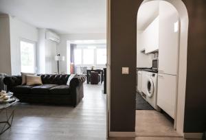 Kuchyň nebo kuchyňský kout v ubytování Lisbon South Beach Apartment