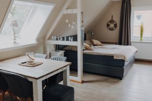 Postel nebo postele na pokoji v ubytování Lagune No1