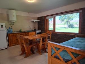 Kuchyň nebo kuchyňský kout v ubytování Cabañas Posada del Angel