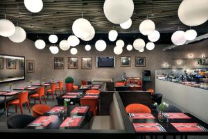 Reštaurácia alebo iné gastronomické zariadenie v ubytovaní Metropol Design Hotel Old Town