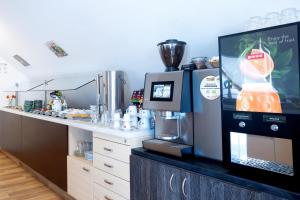 Kuchyň nebo kuchyňský kout v ubytování Andante Hotel Erding