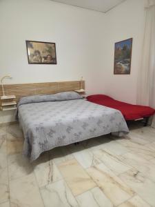 Katil atau katil-katil dalam bilik di Metis Apartments Bellizzi