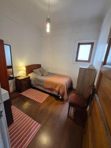 Cama ou camas em um quarto em Hostal Boutique Casa La Barca