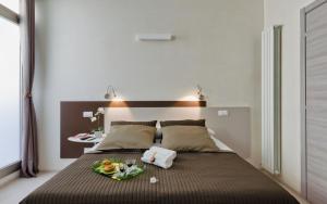 Postel nebo postele na pokoji v ubytování B&B Radici