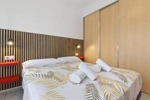 Postel nebo postele na pokoji v ubytování Sol Montemar 10 by IVI Real Estate