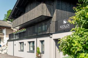 a building with a sign that reads music cafe at KUCKUCK Leogang by we rent in Leogang