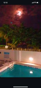 Kolam renang di atau dekat dengan Apartamento pé na areia em Maragogi