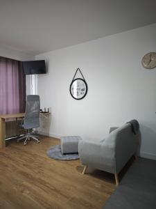 Posezení v ubytování charmante studio 45m2