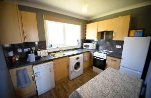 Η κουζίνα ή μικρή κουζίνα στο Gairloch View Holiday Cottages