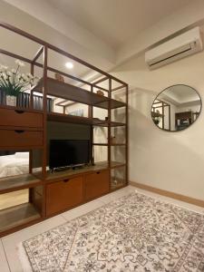 Postel nebo postele na pokoji v ubytování Timur Bay Seafront Kuantan by Ar-Raudhah Suites