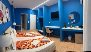 A bed or beds in a room at CALYPSO