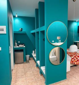 A bed or beds in a room at CALYPSO