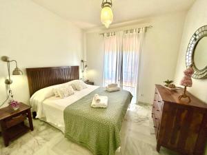 GATU PREMIUM Villa Sal Marina "preferente para mayores de 25 años y familias "にあるベッド