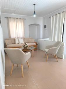 Posezení v ubytování Poseidon Apartments