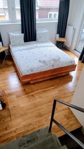 Postelja oz. postelje v sobi nastanitve Loftsuite