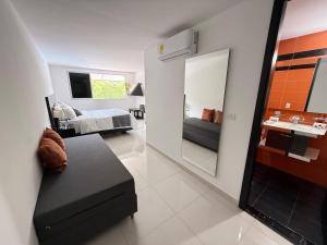 Televiisor ja/või meelelahutuskeskus majutusasutuses Malokas Resort - Socorro - San Gil
