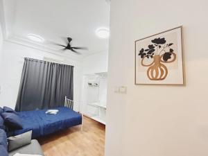 Postel nebo postele na pokoji v ubytování Up to 6 Pax, Next to Paradigm mall JB with Big Patio & Pool Access