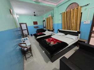 Una cama o camas en una habitación de Hotel Welcome Nepal