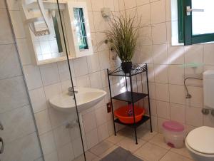 Koupelna v ubytování Apartment Corto + 24 fotografií