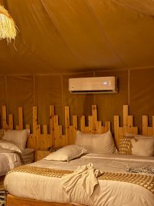 Postel nebo postele na pokoji v ubytování Royal Sands Camp