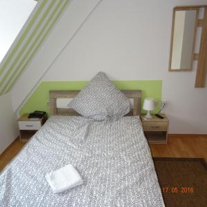Ein Bett oder Betten in einem Zimmer der Unterkunft Hotel Einstein