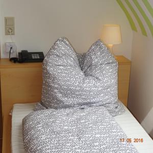 Ein Bett oder Betten in einem Zimmer der Unterkunft Hotel Einstein