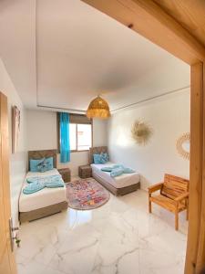 Voodi või voodid majutusasutuse KAZA Moon Hostel toas