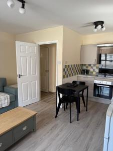 Η κουζίνα ή μικρή κουζίνα στο 11 York House apartment